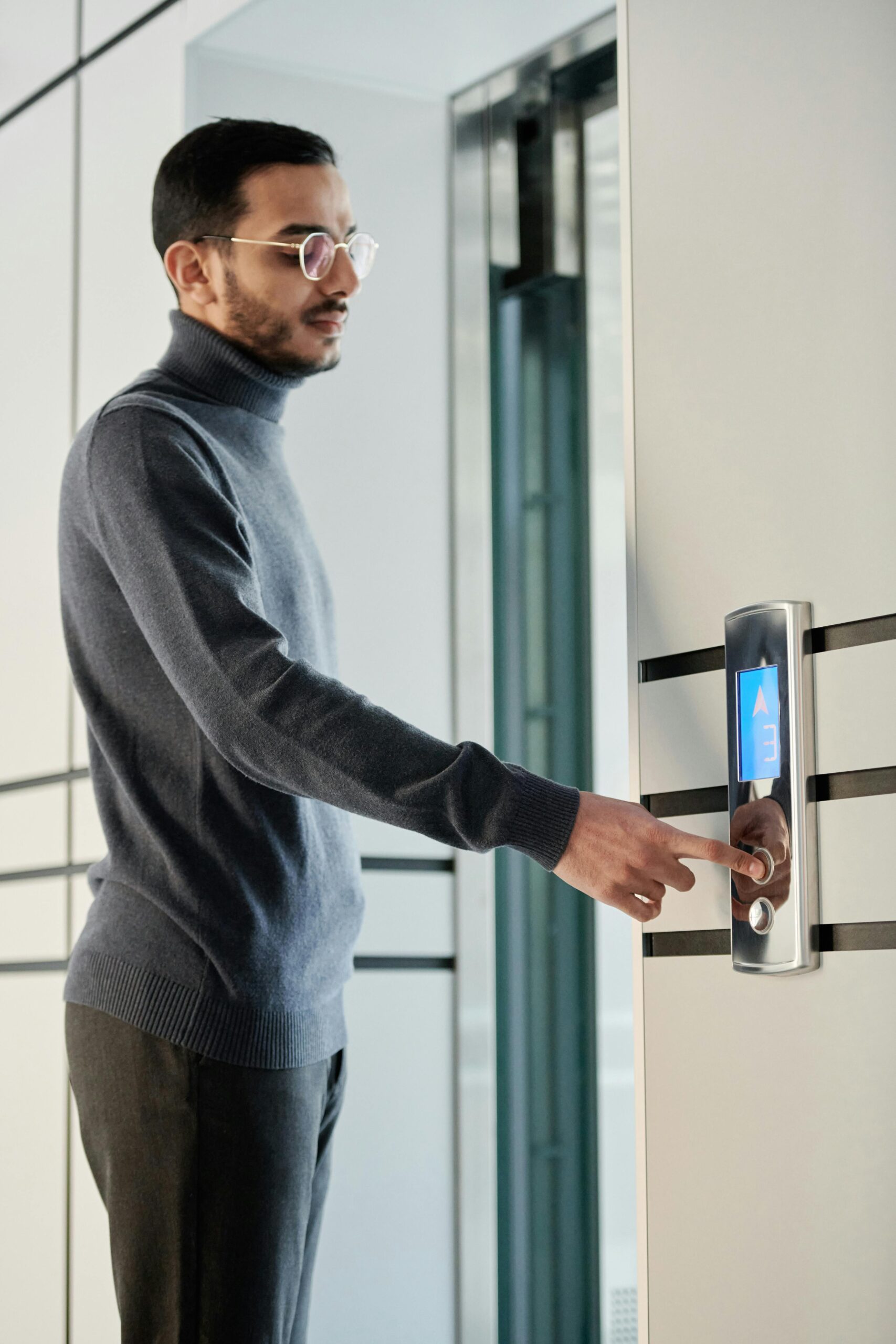 Man pressing a smart doorbell – best smart home security devices for modern homes