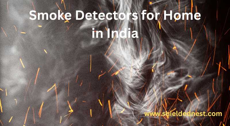 Smoke detectors for home in India detecting fire and smoke sparks in a dark background