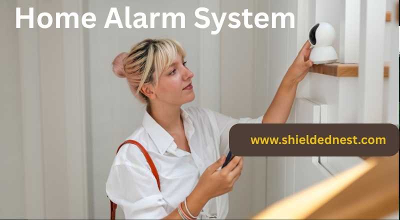 Top Features to consider for a Home Alarm System in Indian - 2026 Guide. Lady analysing home alarm system